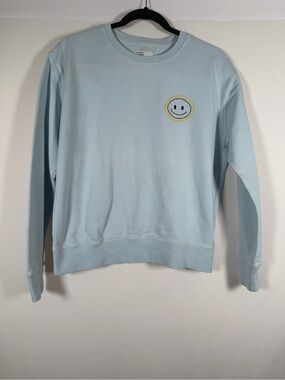 Colorful Standard Women’s Light Blue Organic Crewneck Sweatshirt with Smiley Sun